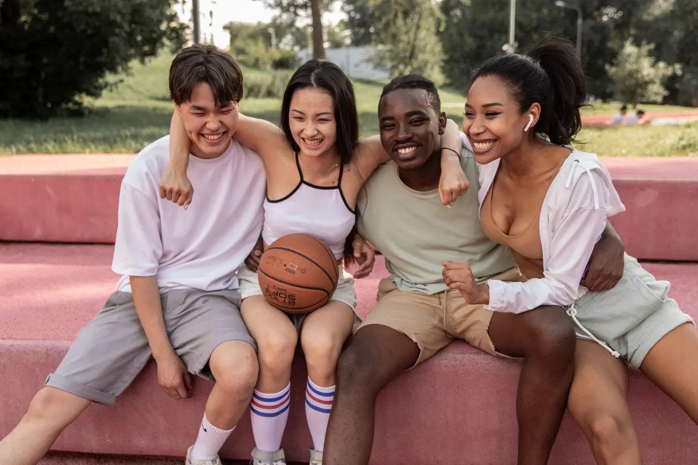 A group of teenage friends laughing together